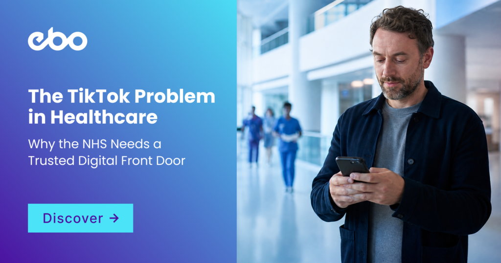 A person stands in a bright, modern NHS hospital atrium holding a smartphone, caught between two paths. One side is tinged with a faint magenta glow suggesting scattered online health information and social media noise, while the other opens into calm, reassuring NHS-blue tones representing a trusted, professional digital front door. Clean architectural lines and natural light from tall windows frame the scene, evoking clarity, trust, and the choice between fragmented digital advice and authoritative healthcare guidance.