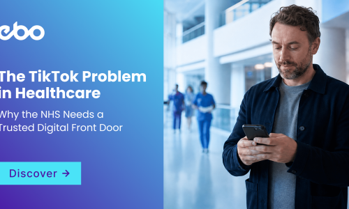 A person stands in a bright, modern NHS hospital atrium holding a smartphone, caught between two paths. One side is tinged with a faint magenta glow suggesting scattered online health information and social media noise, while the other opens into calm, reassuring NHS-blue tones representing a trusted, professional digital front door. Clean architectural lines and natural light from tall windows frame the scene, evoking clarity, trust, and the choice between fragmented digital advice and authoritative healthcare guidance.
